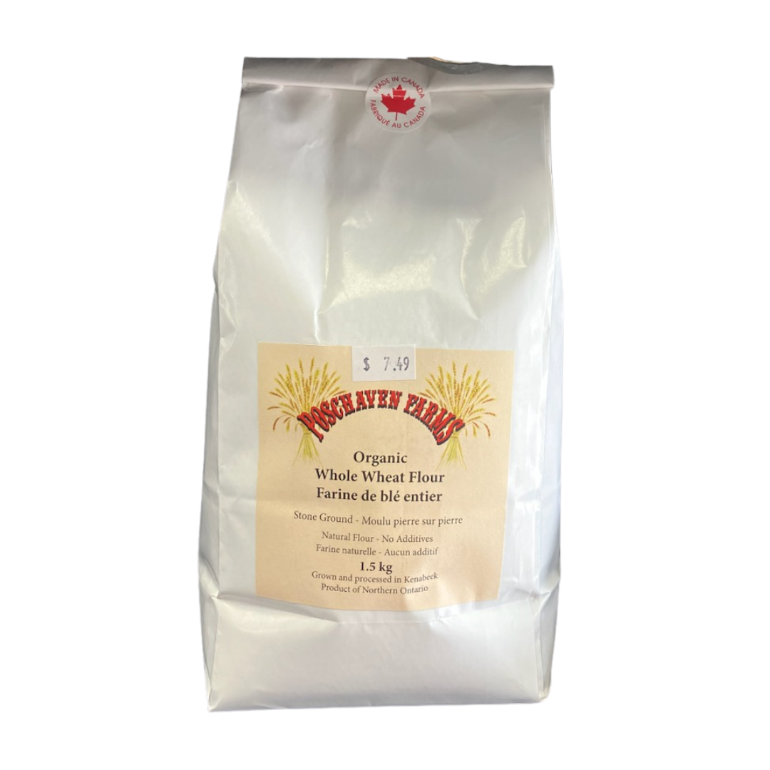 Bag of organic whole wheat flour with a label on a white background