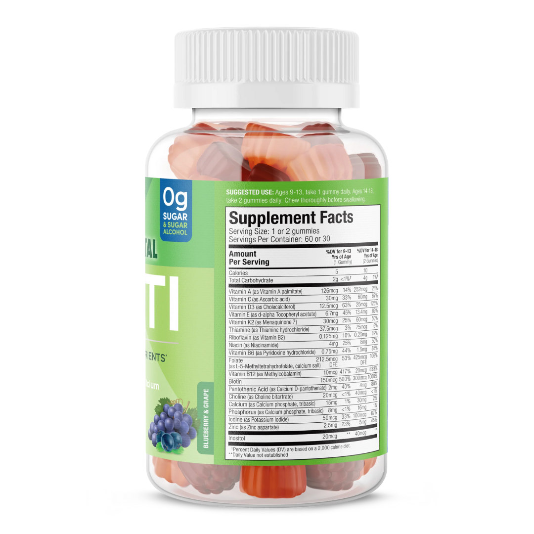 Side view of SUKU Teen Boy Total Multi bottle displaying supplement facts. Includes dosage for ages 9–13 (1 gummy daily) and 14–18 (2 gummies daily). Nutrient list includes vitamins A, C, D3, E, B12, K2, zinc, and more.