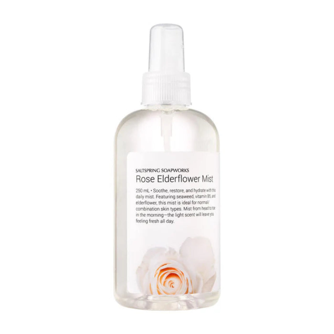 Clear bottle of Rose Elderflower Mist with a white cap on a white background