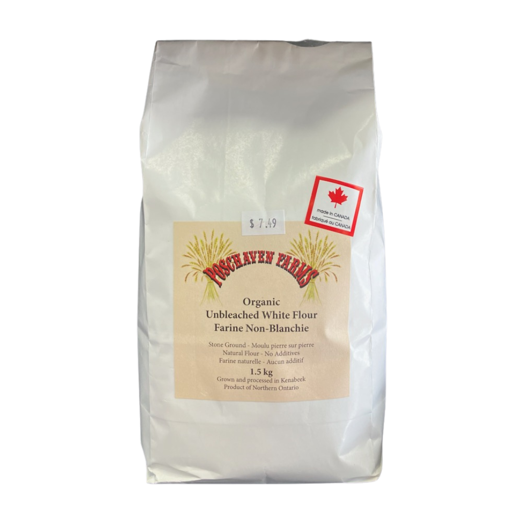 Bag of organic unbleached white flour with a label on a white background