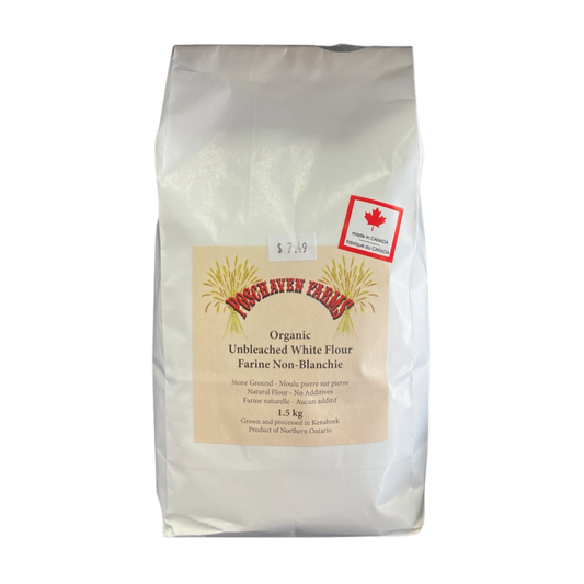 Bag of organic unbleached white flour with a label on a white background