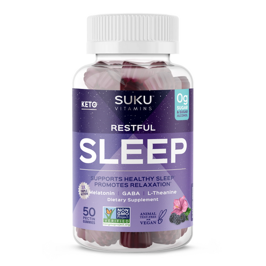 Bottle of SUKU Vitamins "Restful Sleep" gummies with a deep purple night-sky-themed label. Contains 50 blackberry hibiscus-flavored pectin gummies. Promotes relaxation and healthy sleep with Melatonin, GABA, and L-Theanine. Vegan, Non-GMO, 0g sugar or sugar alcohol.