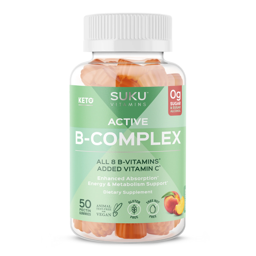  Bottle of SUKU Vitamins “The Complete Women’s Multi” with 21 essential micronutrients, 0g sugar, and CoQ10. Pink label with pineapple and peach illustration.
