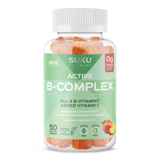  Bottle of SUKU Vitamins “The Complete Women’s Multi” with 21 essential micronutrients, 0g sugar, and CoQ10. Pink label with pineapple and peach illustration.