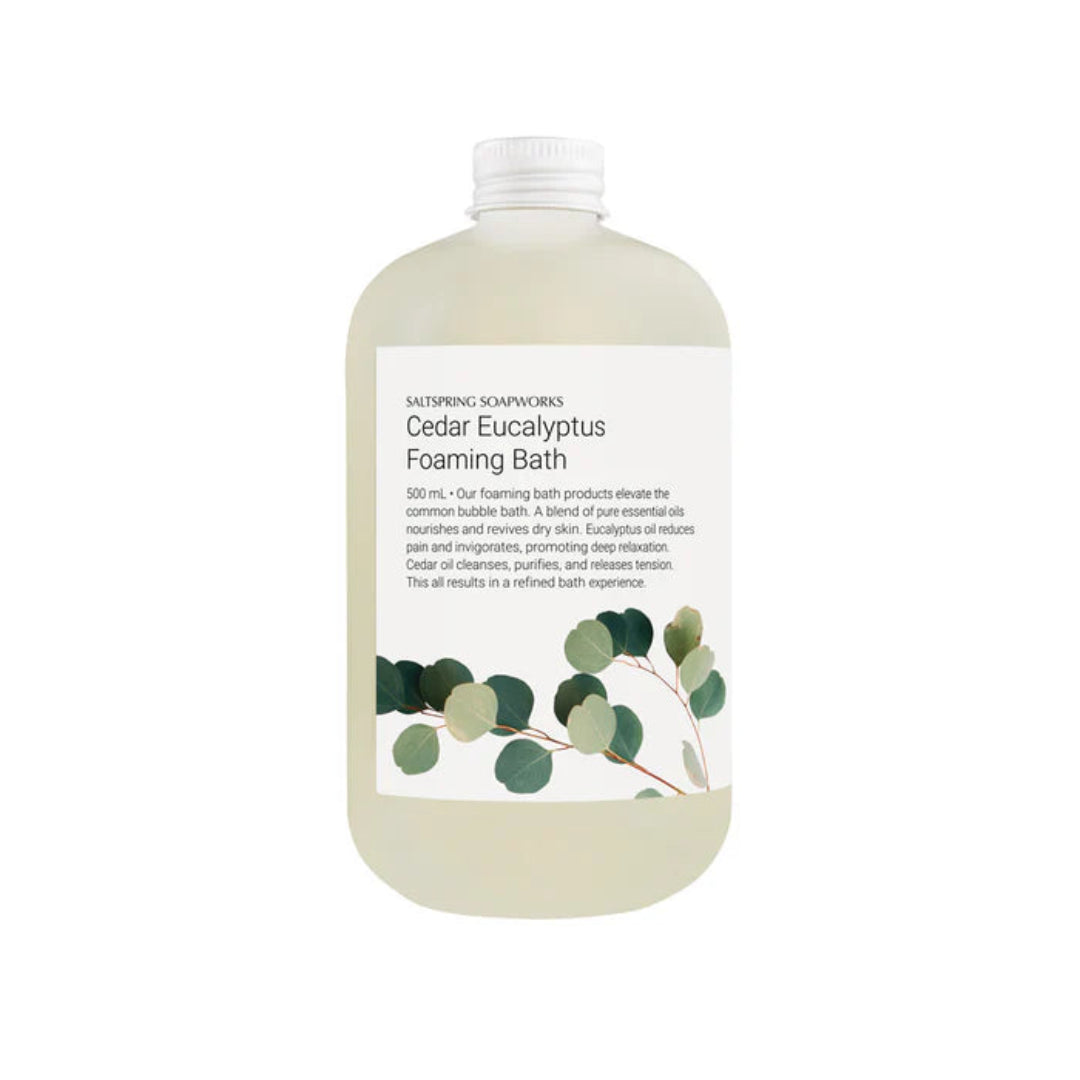 Bottle of Cedar Eucalyptus Foaming Bath with a white label on a white background