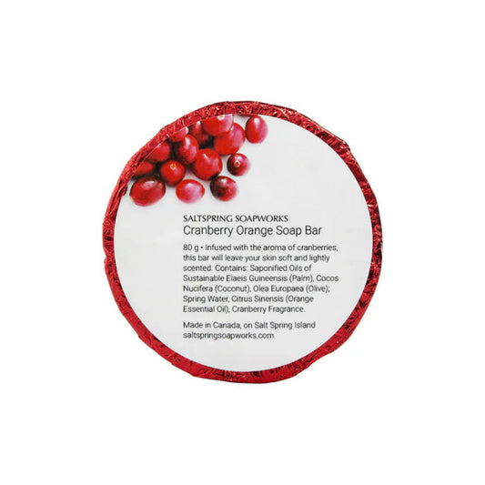 Cranberry Orange Soap Bar packaging with red cranberries on a white background