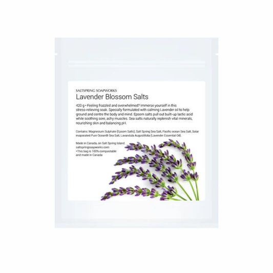 Lavender Blossom Salts packaging with lavender flowers on a white background