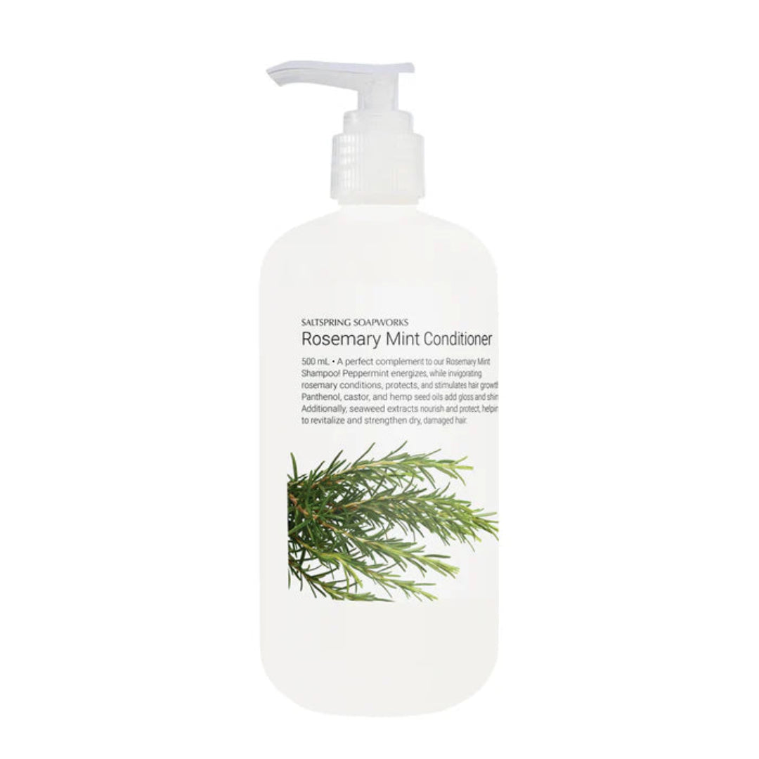 White bottle of Rosemary Mint Conditioner with a green leaf on a white background