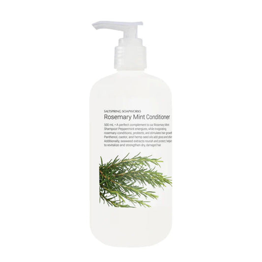 White bottle of Rosemary Mint Conditioner with a green leaf on a white background