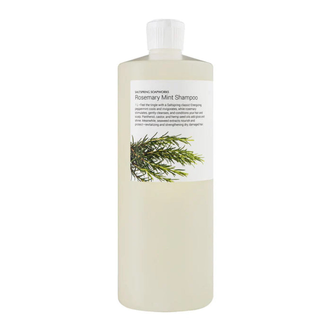 Bottle of Rosemary Mint Shampoo with a label on a white background