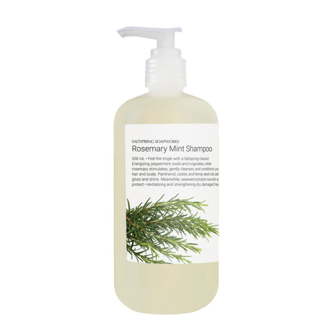 Bottle of Rosemary Mint Shampoo with a pump on a white background