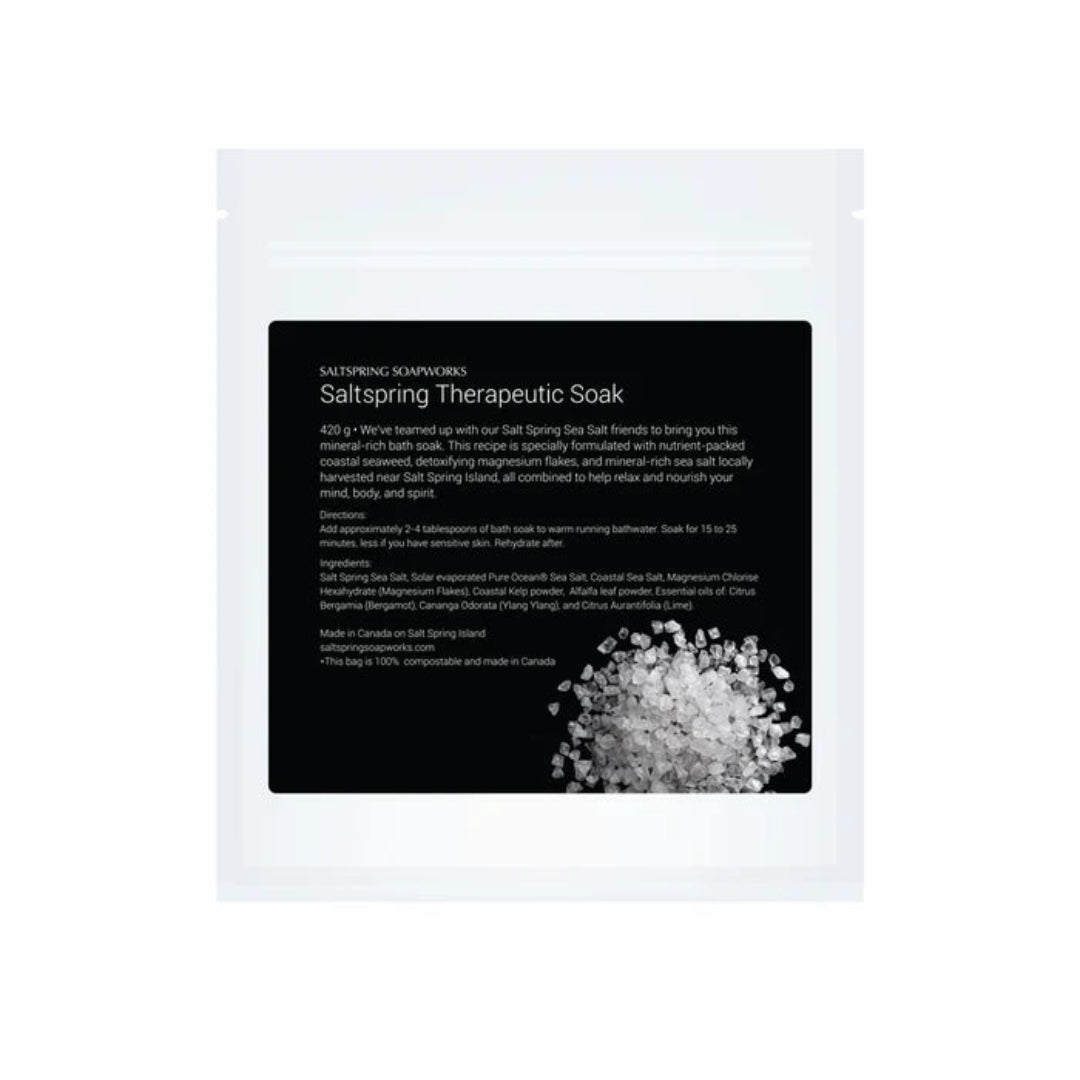 Saltspring Soapworks therapeutic soak packaging with text and a small amount of salt visible.